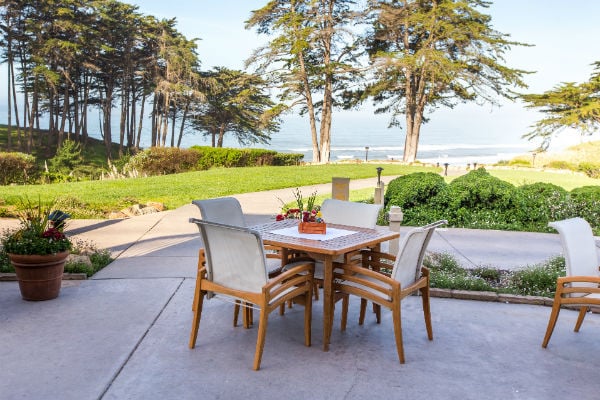 A view of the outdoor Patio at Sanderlings at Seascape Beach Resort. This spot is a bluff top patio that overlooks the majestic Monterey Bay. 