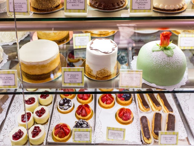 Glass case displaying desserts at Gayle's Bakery & Rosticceria