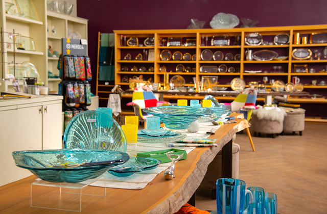 Annieglass has handcrafted glassware that is one-of-a-kind. They have different shapes and colors of glassware.