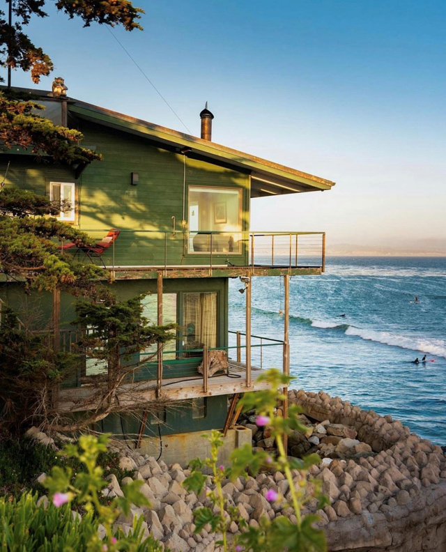 Best of 2021: This Photo is one of the top posts for 2021 on the Visit Santa Cruz County Social Media Channels. This photo of Jack O'Neill's home on the cliffs of Pleasure Point by @skylarkabroad.