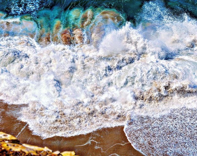 Overview image of the ocean as waves are crashing