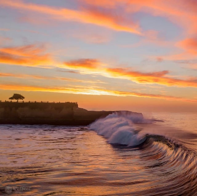 Sunset photo of the waves that captures the coastline of Santa Cruz