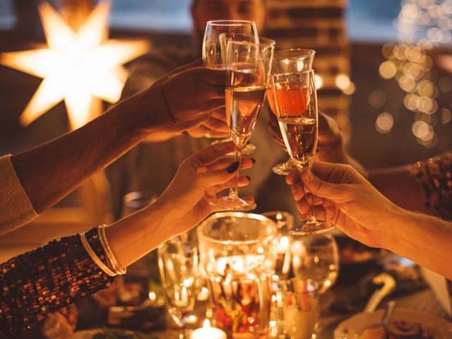 Clinking glasses for New Year's Eve