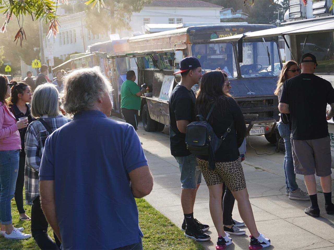 Food truck patrons on a fall day