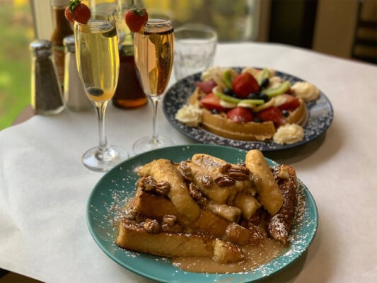 Banana Foster French Toast and Waffle at Heavenly Cafe. Photographed by Monica Multer