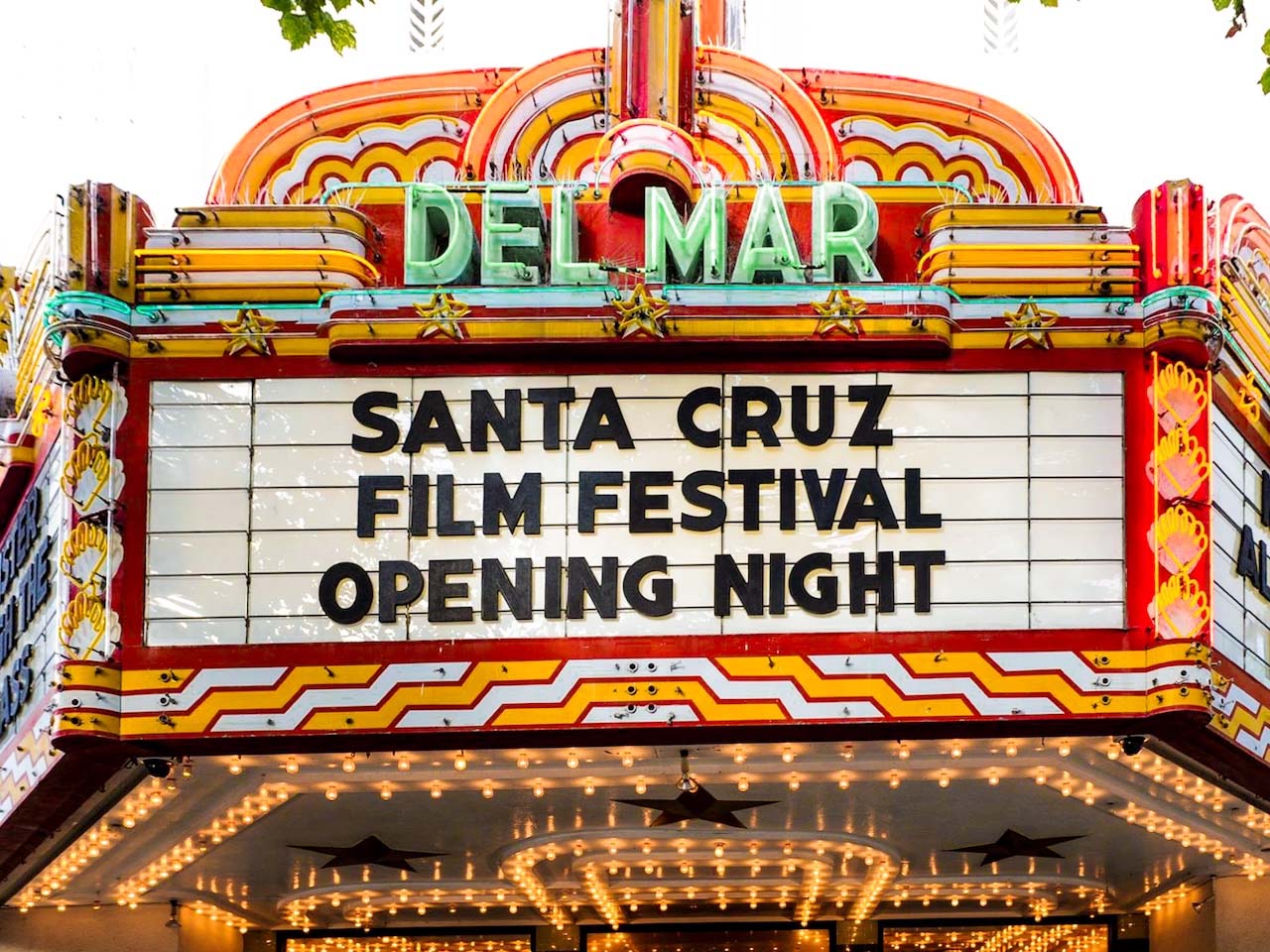 The Del Mar Historical Theatre Marquee with lights showing the opening night of the Santa Cruz Film Festival