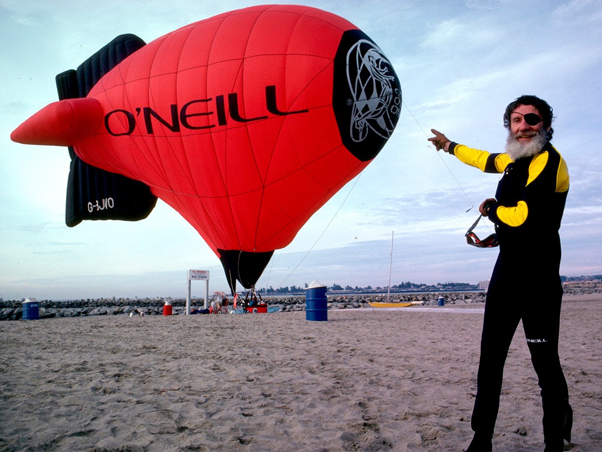 Jack O'Neill photo with a red air balloon. Photo courtesy of Jack O'Neill family