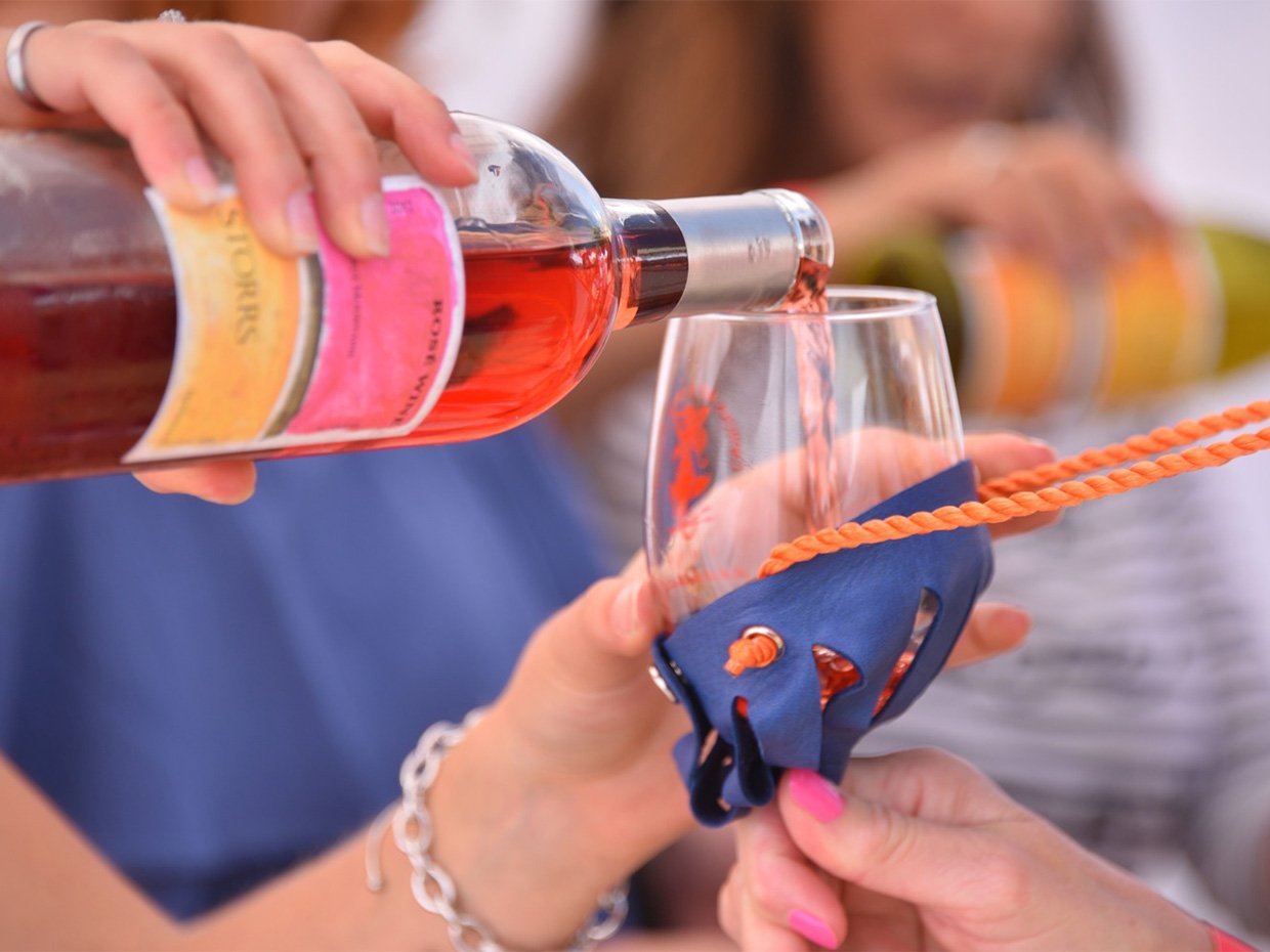 Pouring Storrs Rose at the Capitola Art & Wine Festival. Photographed by Paul Schraub