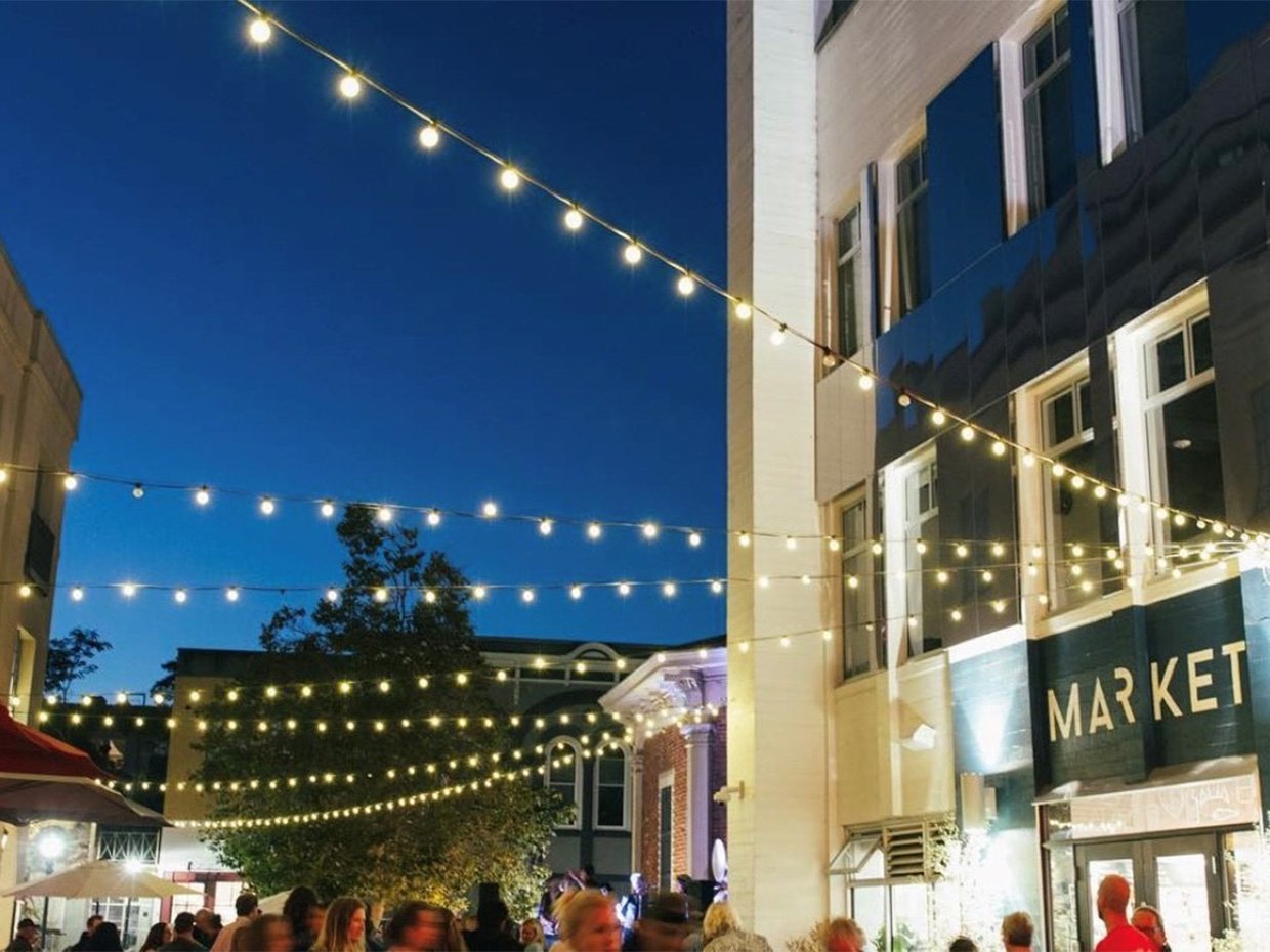 Patio lights over Abbott Square during First Friday. Photographed by Crystal Birns