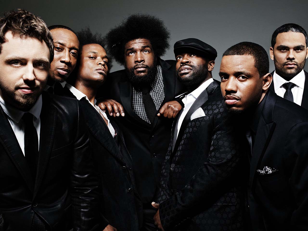 The Roots band in black suits
