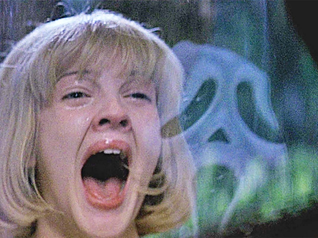Drew Barrymore screaming at a mask
