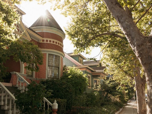 Walnut Ave lined with victorian houses. Photographed by Ben Ingram