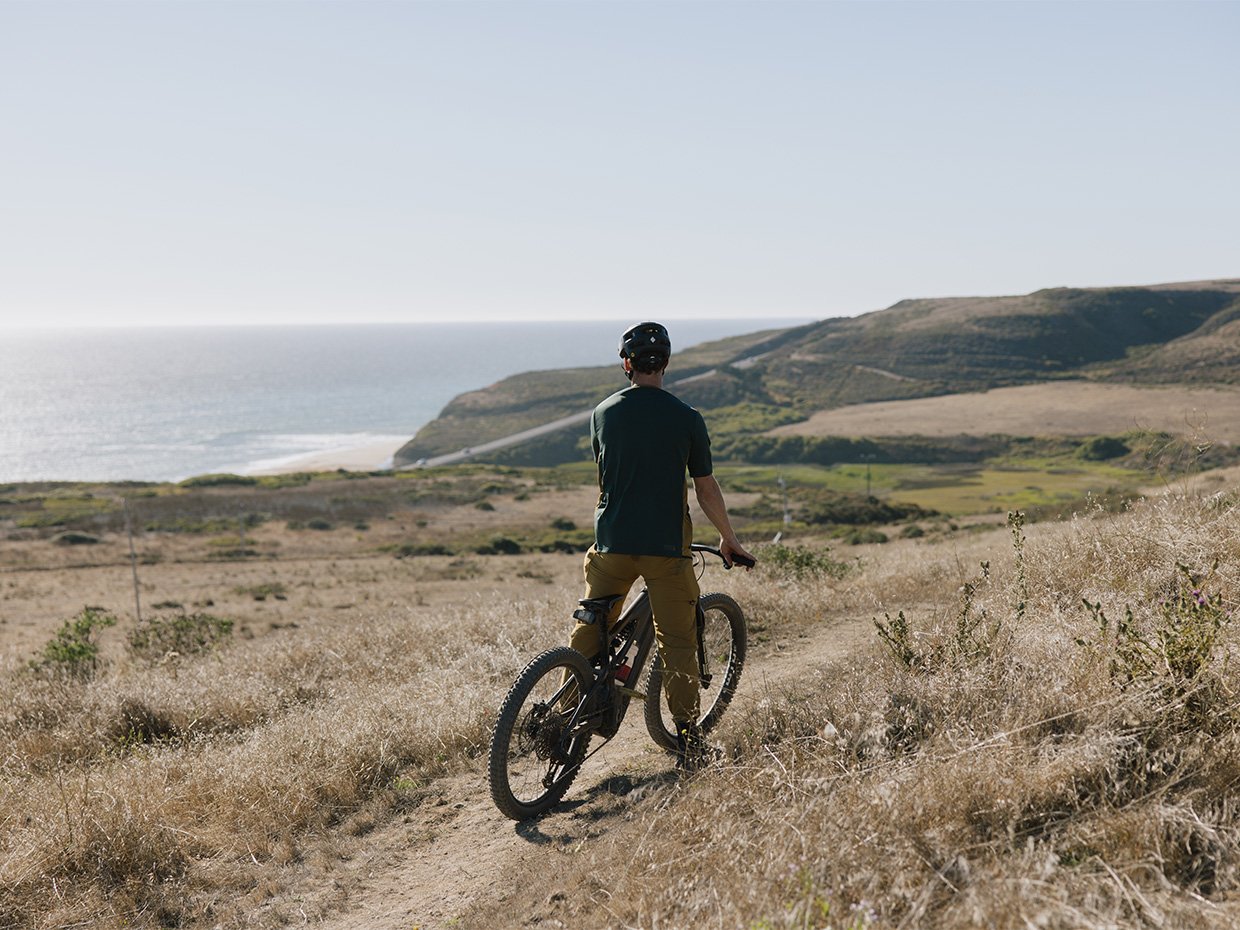 Person on a dirt bike at Cotoni Coast Dairies. Photographed by Ben Ingram