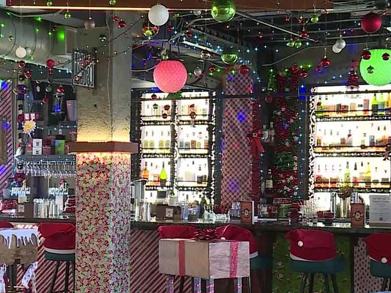 A bar with Christmas decorations everywhere