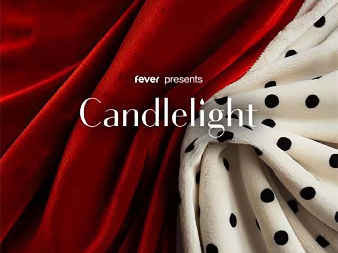 Candlelight logo over a red velvet robe with white and black polka dot trim