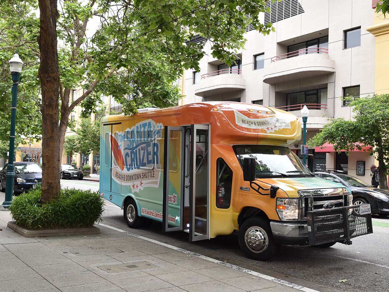 Shuttle on a tree lined street