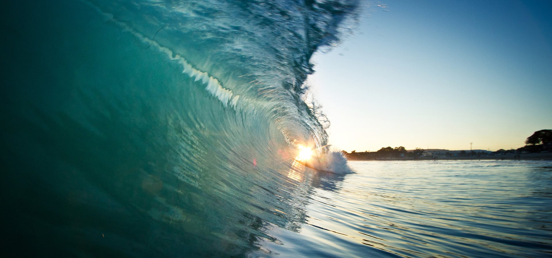 Santa Cruz County ocean wave at sunset by Ben Ingram