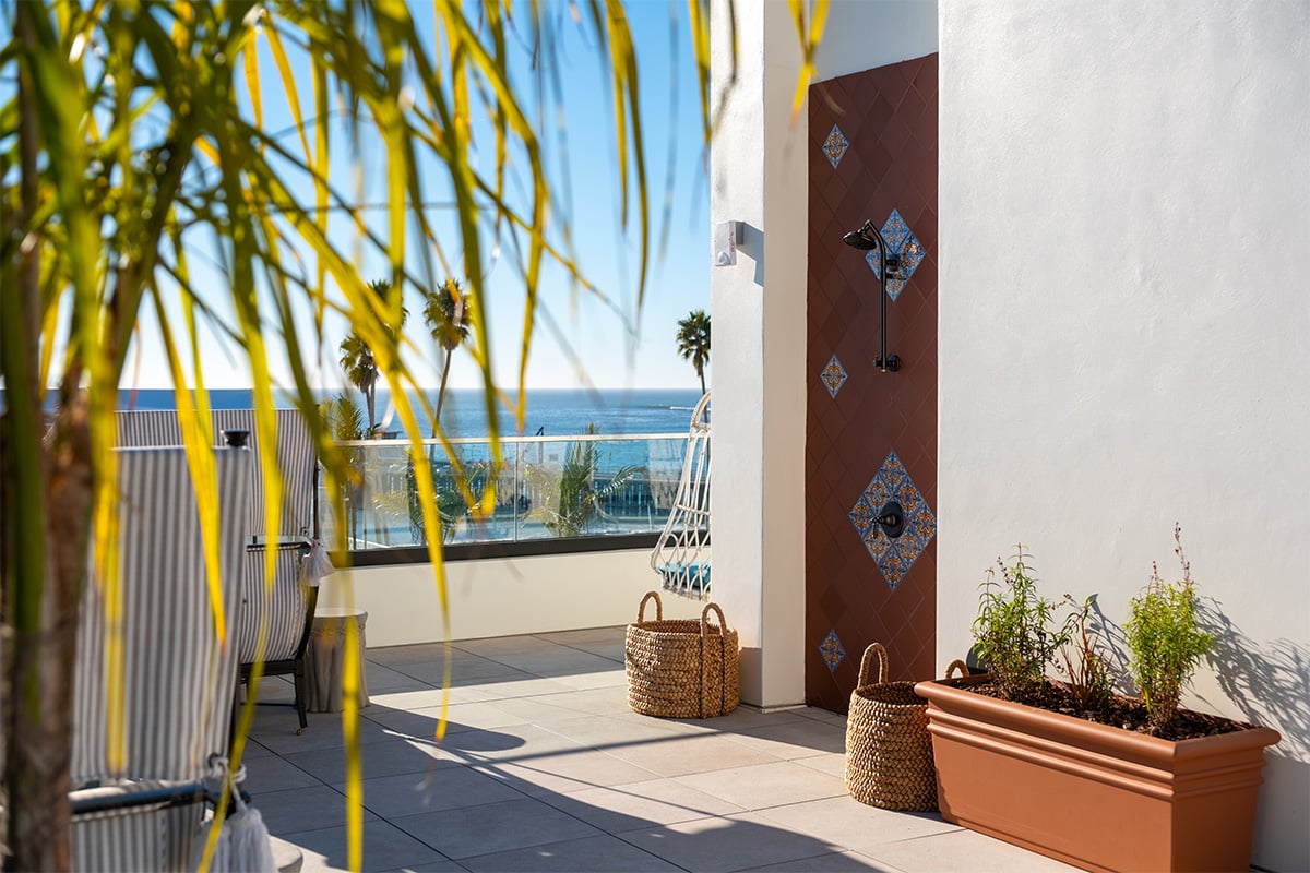 Spa shower at La Bahia with a view of the Santa Cruz Wharf and Monterey Bay. Photographed by Daniel Gorostieta