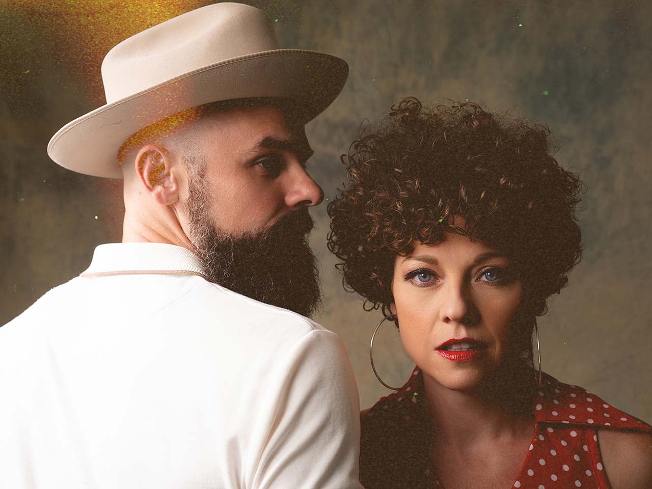 Husband a and wife posing for a portrait