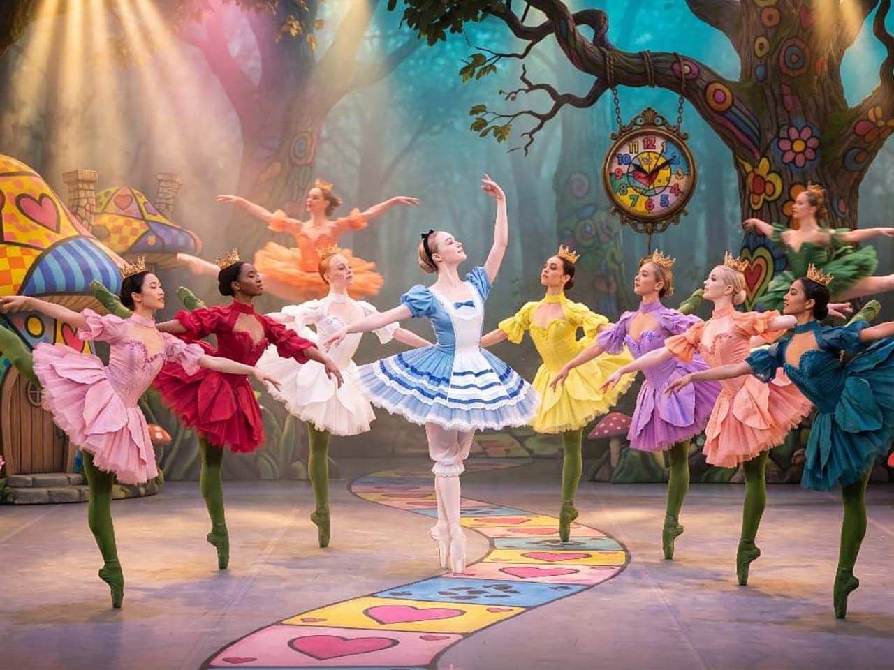 Ballerinas dressed as flowers with a wild pop culture elaborate colorful set