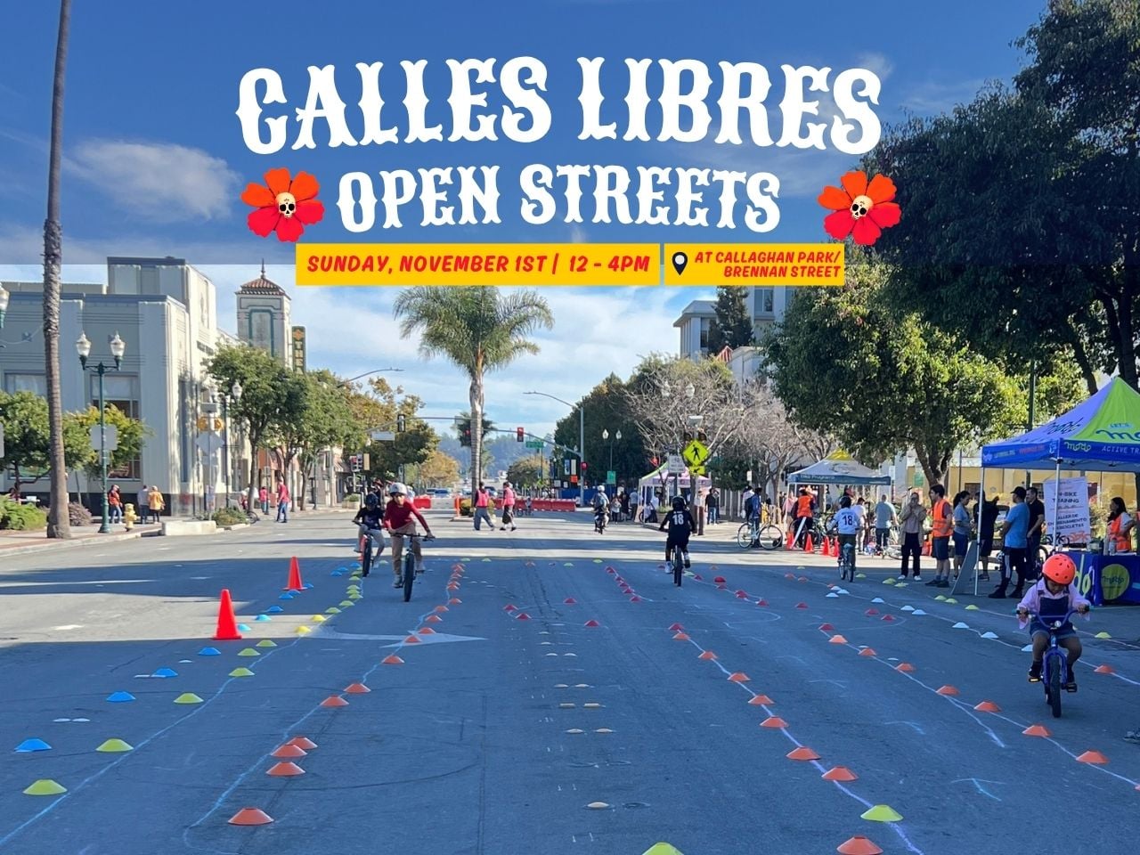Kids doing a bike rally where cars usually drive in downtown Watsonville