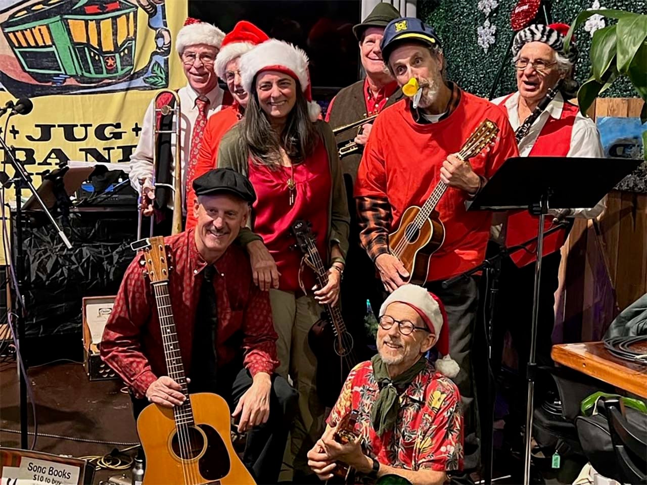 A jug band dressed in holiday gear